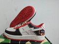 BAPE STA Low-Top Sneakers – Black, White & Red with Character Graphic